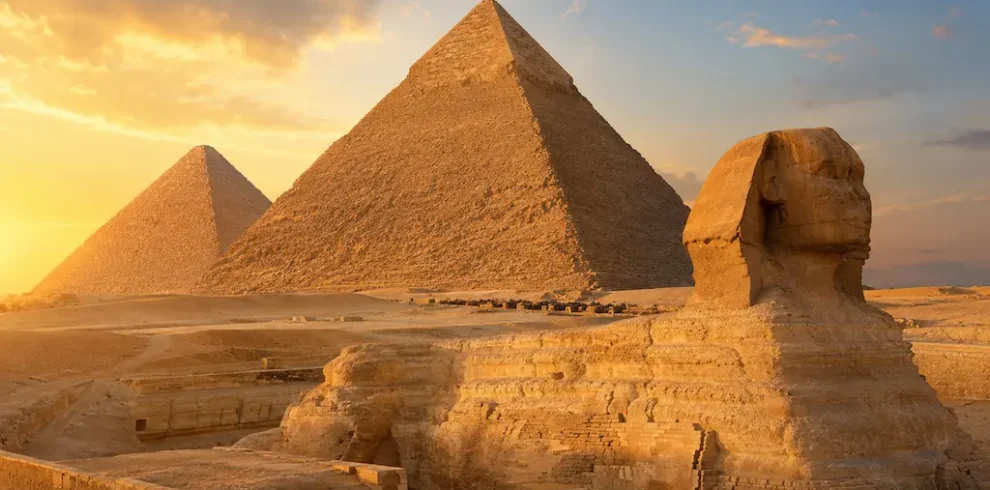 The Great Pyramids and Sphinx of Giza in Egypt at golden hour